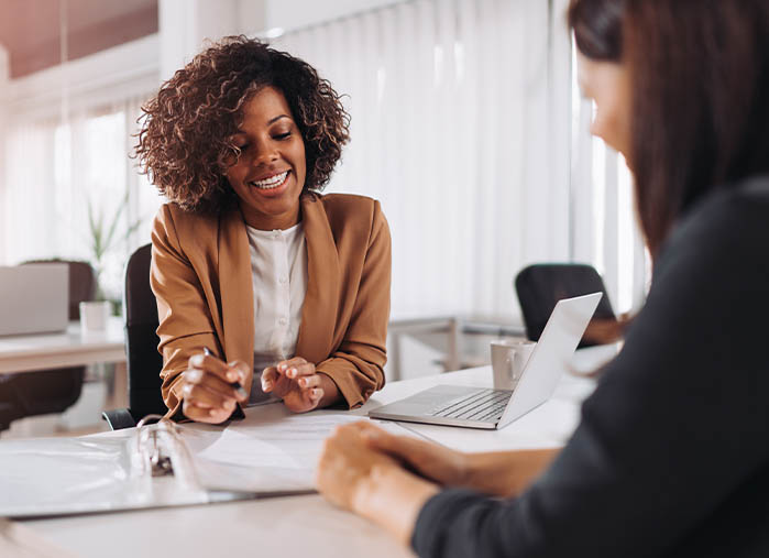 Insurance Agent meeting with a client.