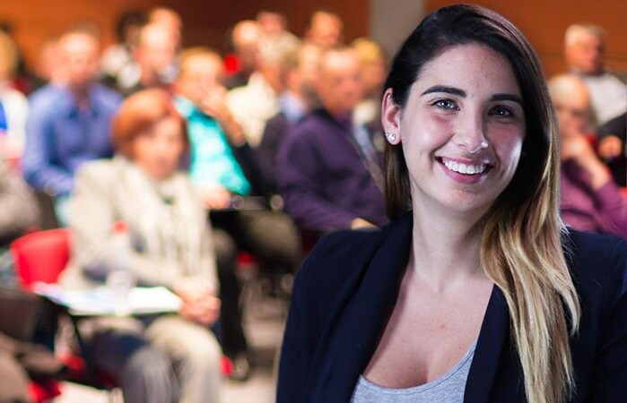 Lead Concepts employee pictured in front of an audience.