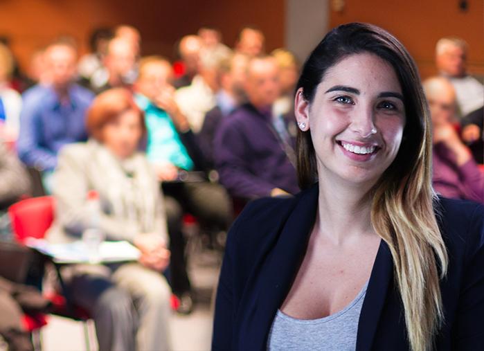 Lead Concepts employee pictured in front of an audience.