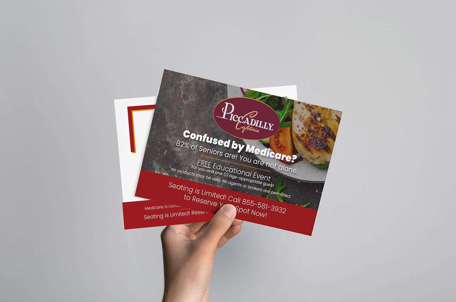 Image of a hand holding two seminar marketing mailers.