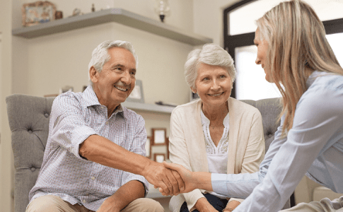 An image of a preneed agent communicating with a client.